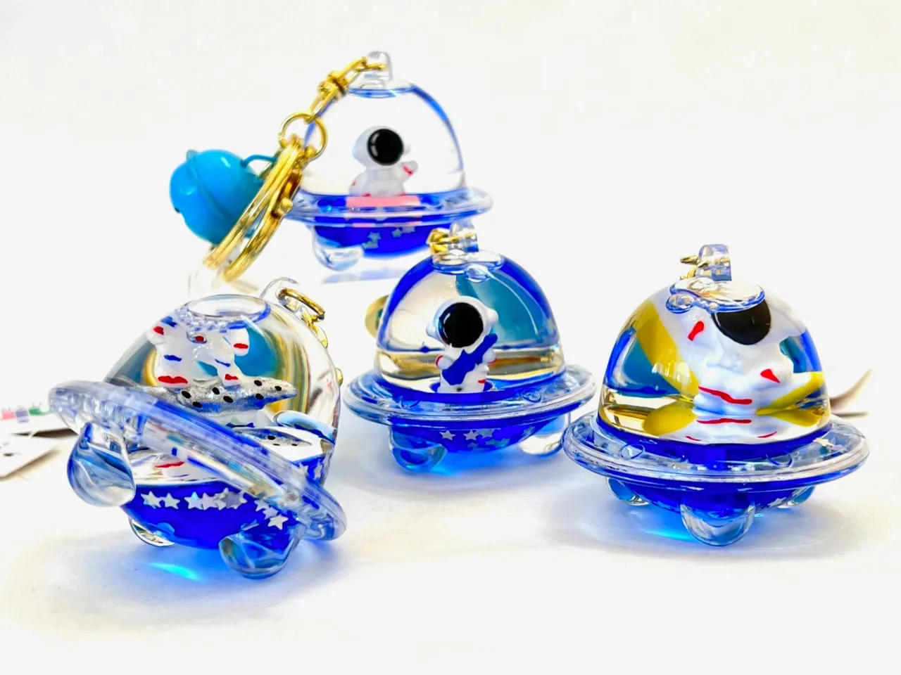 12102 ASTRONAUT UFO FLOATY KEY CHARM-12