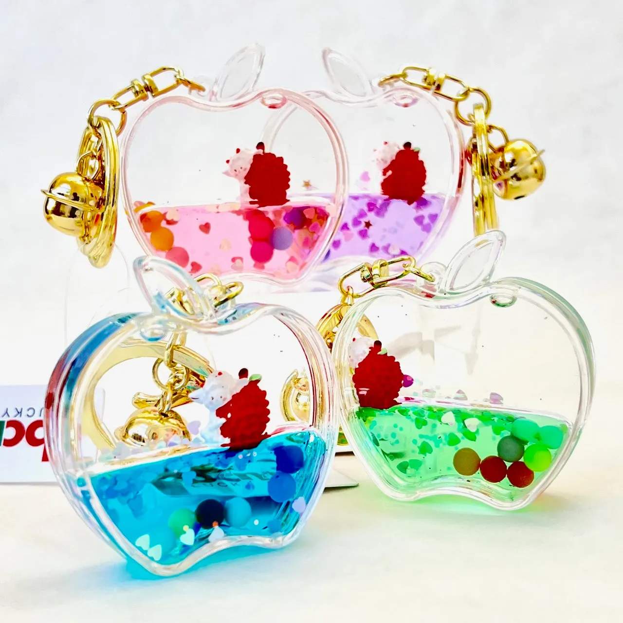 12111 APPLE FLOATY KEY CHARM-12