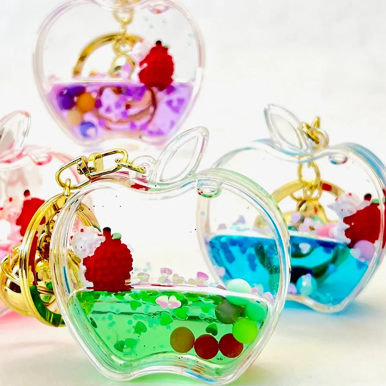 12111 APPLE FLOATY KEY CHARM-12