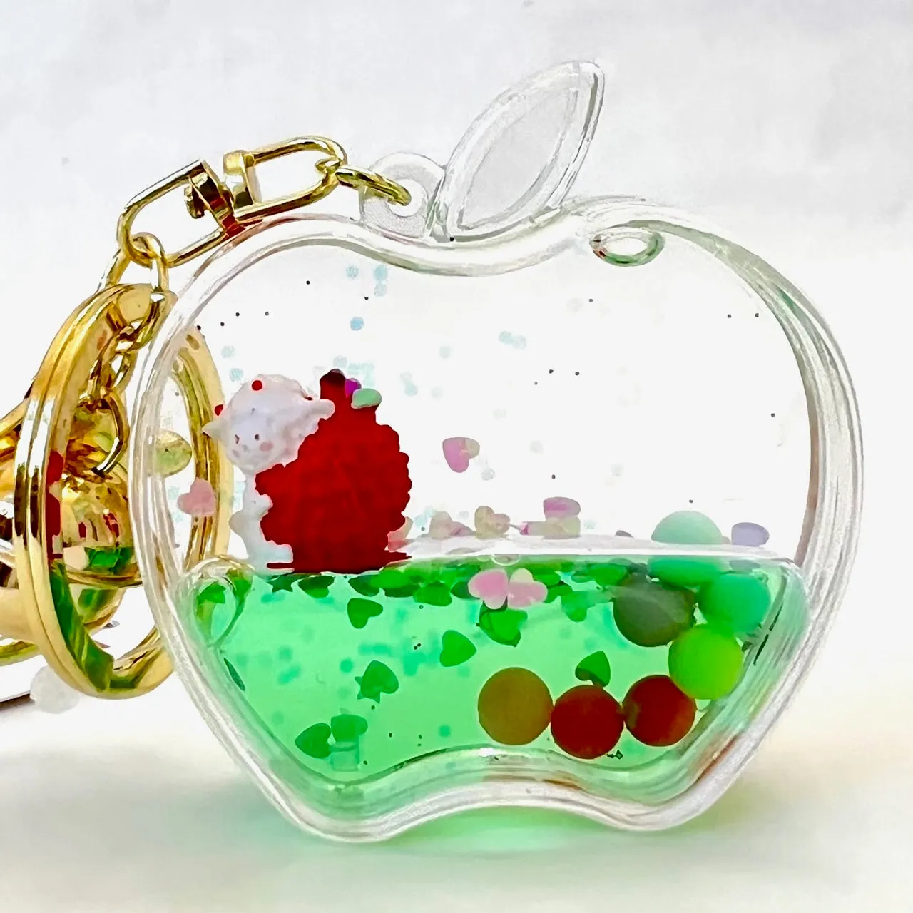 12111 APPLE FLOATY KEY CHARM-12