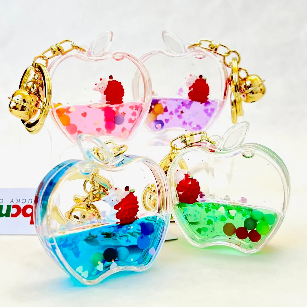 12111 APPLE FLOATY KEY CHARM-12