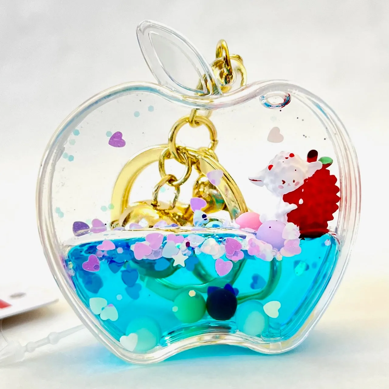 12111 APPLE FLOATY KEY CHARM-12