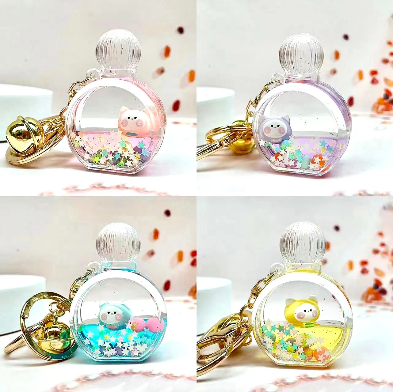 12114 KITTY PERFUME BOTTLE FLOATY KEY CHARM-12