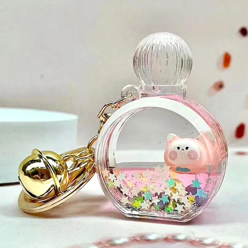 12114 KITTY PERFUME BOTTLE FLOATY KEY CHARM-12