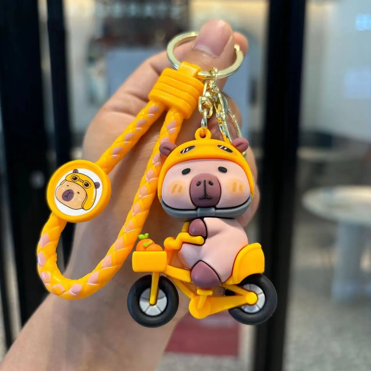 12183 CAPYBARA SCOOTER KEY CHARM-12