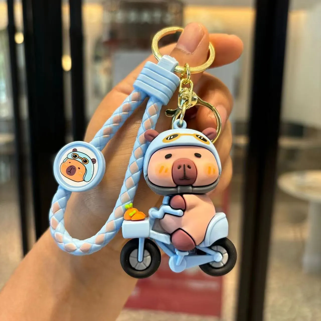 12183 CAPYBARA SCOOTER KEY CHARM-12