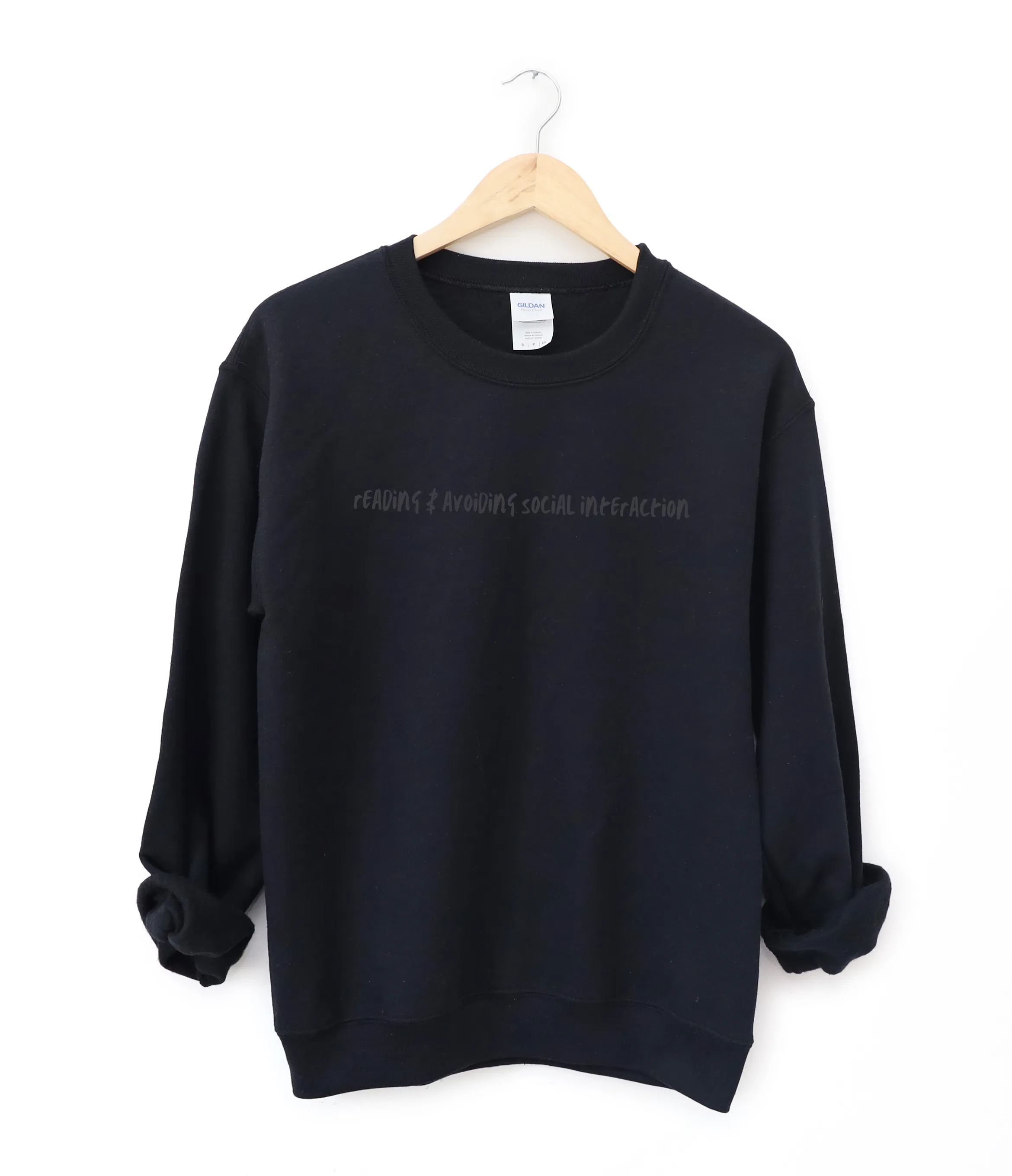 reading & avoiding social interaction embroidered sweatshirt